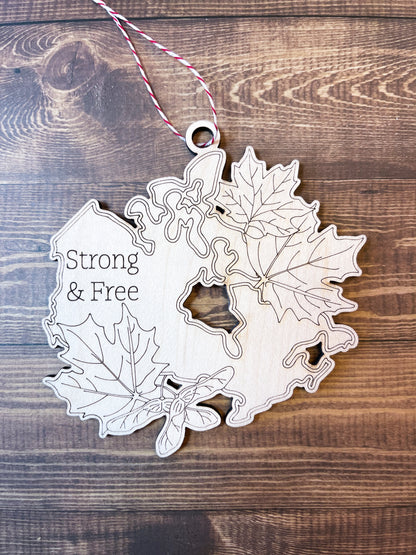 Canada Ornament that says "Strong & Free"